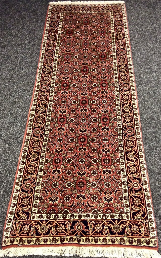 Oriental Rug Shop Purveyors of Fine Rugs & Carpets.