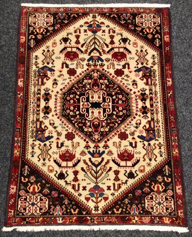Oriental Rug Shop Purveyors of Fine Rugs & Carpets.