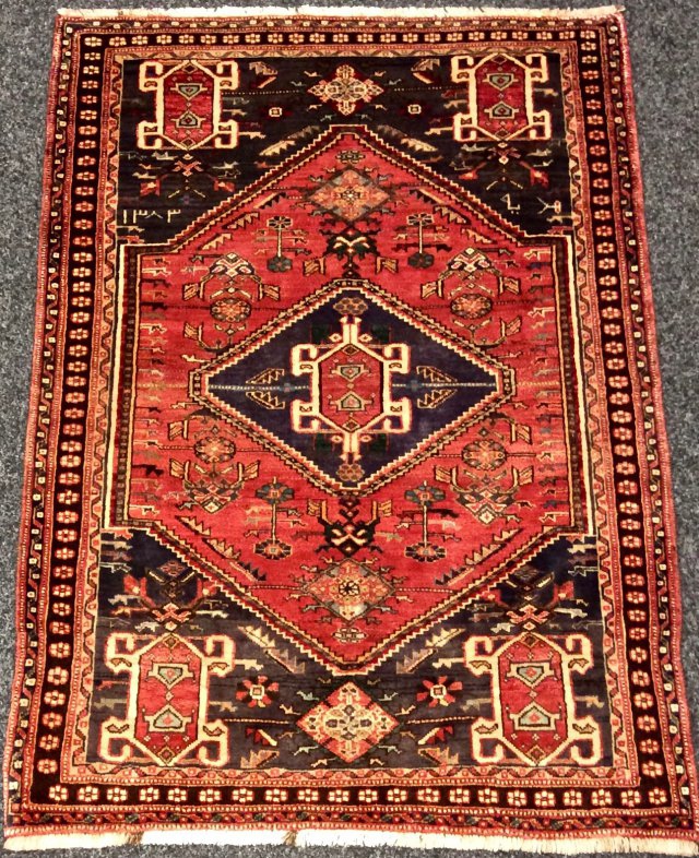 Oriental Rug Shop Purveyors of Fine Rugs & Carpets.